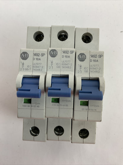 ALLEN BRADLEY 1492-SPM1D100 CIRCUIT BREAKER 277VAC 48VDC SER D 10A (LOT OF 3)