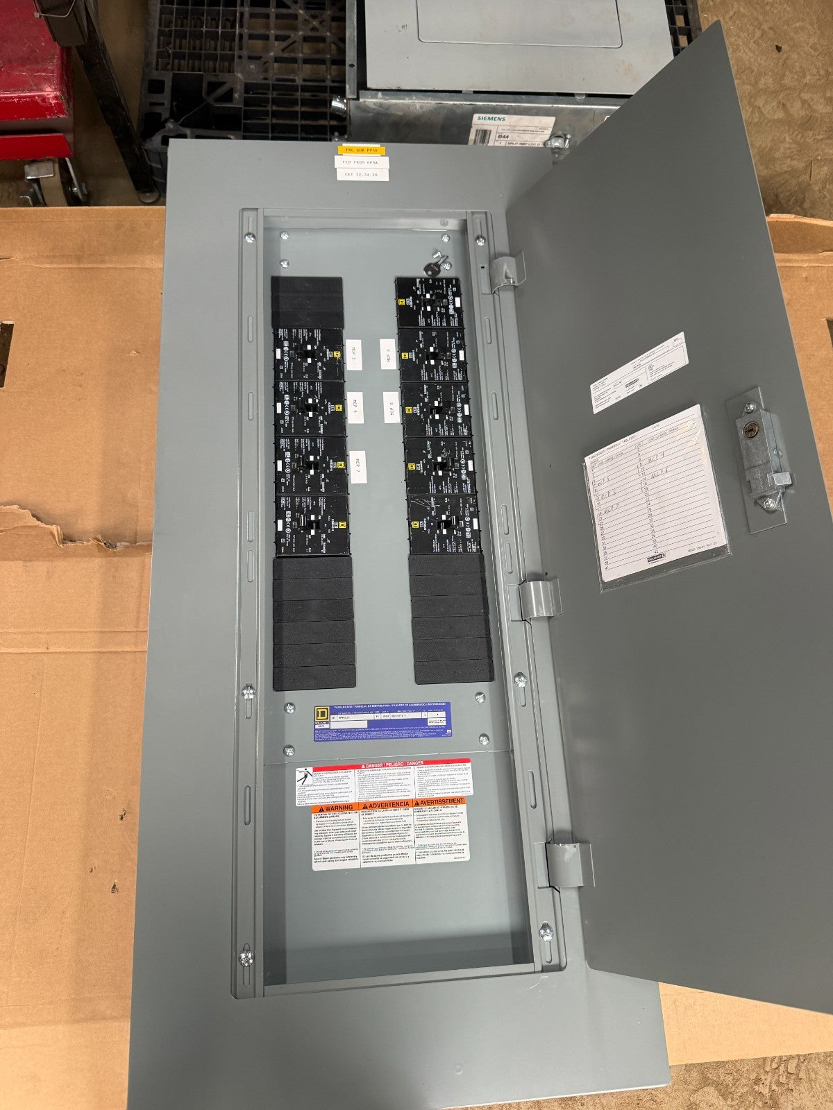 SQUARE D NF442L2C PANELBOARD E1 250A 600Y/347VAC W/ (9)EDB34015 15A CIR. BREAKER